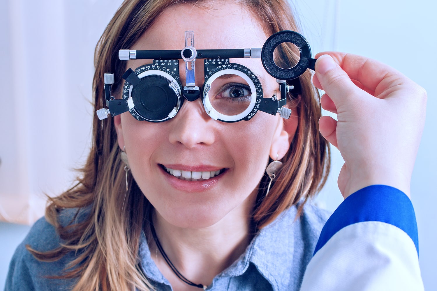 Girl in messbrille glasses in ophthalmology clinic Girl in messbrille glasses in ophthalmology clinic